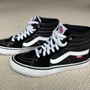Vans Mens Black and White High-Top Sneakers